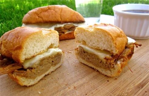 IMG_4160 Cross section of cut french dip sandwiches on cutting board outside.