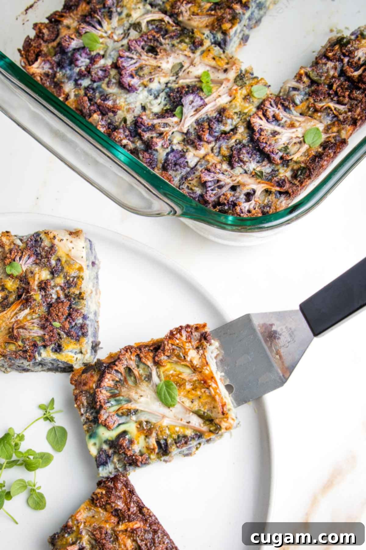 Cauliflower kugel in a baking dish and with spatula on plate.