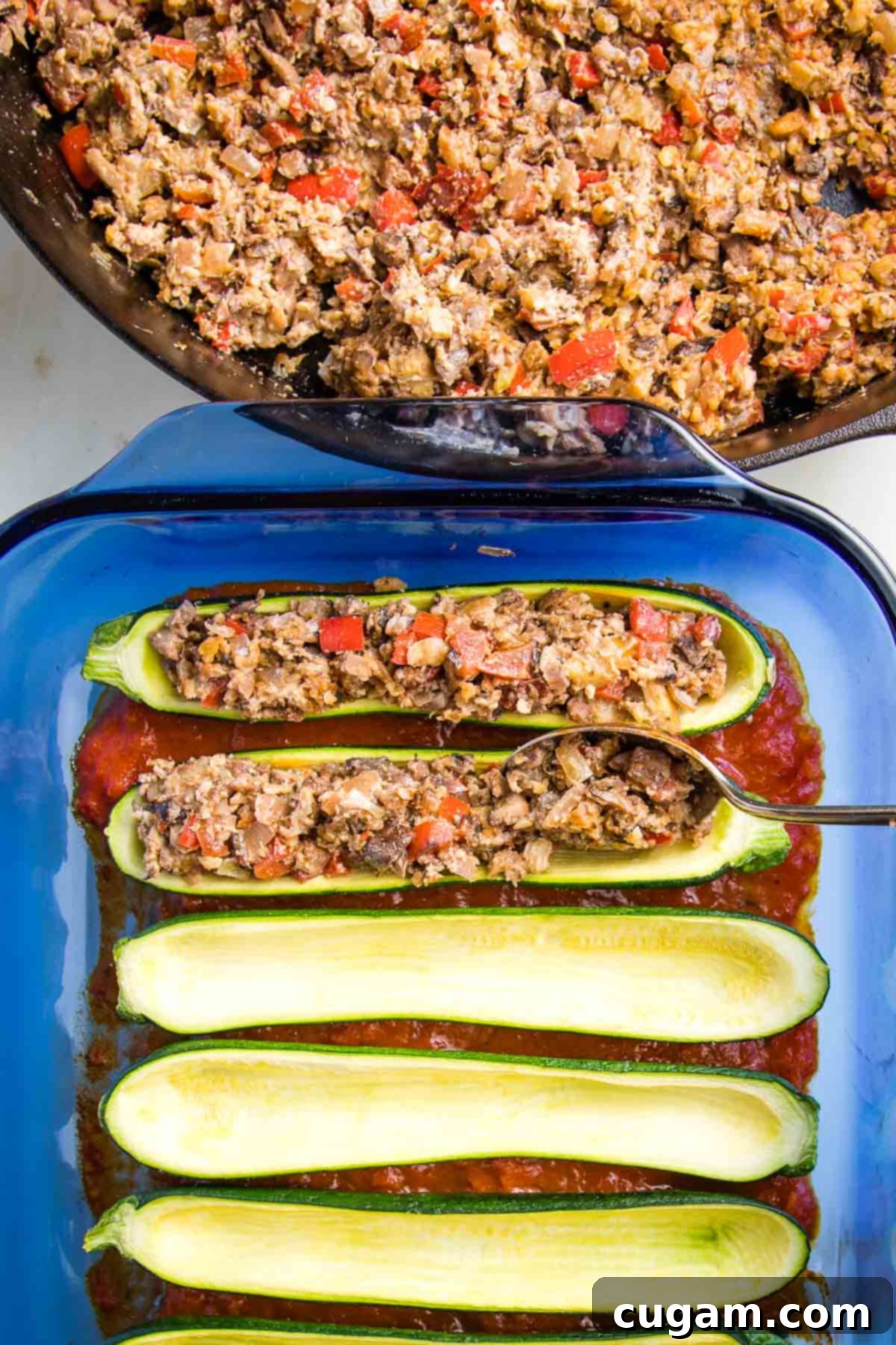 The edge of a pan filled with the savory vegan 
