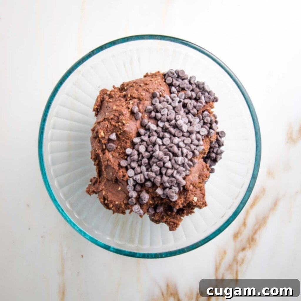 Glass bowl with chocolate cookie dough and mini chocolate chips