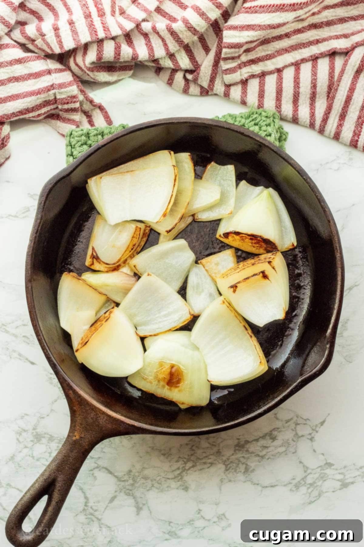 Half an onion, browned and caramelized in a frying pan, for added flavor and color to the broth.