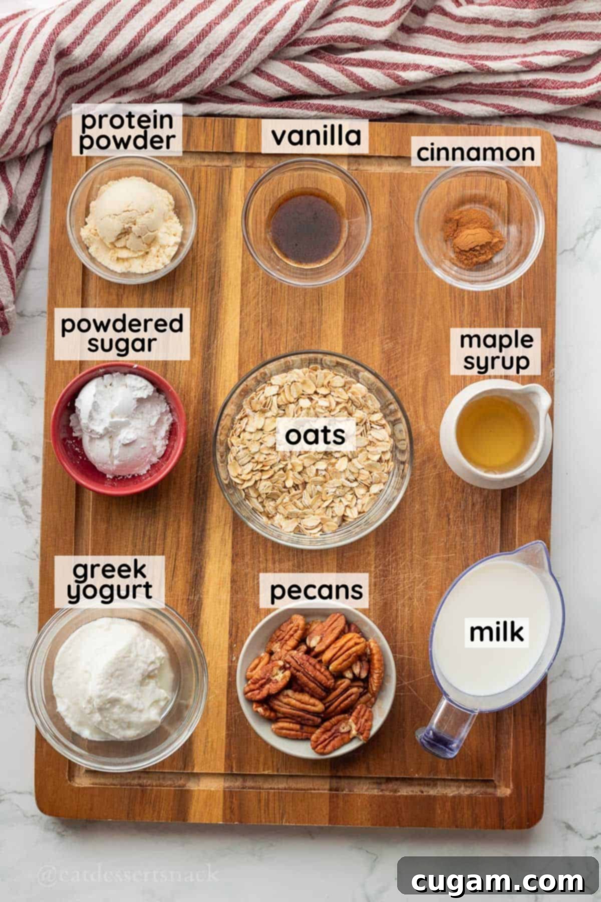Labeled ingredients for cinnamon roll overnight oats in glass bowls.