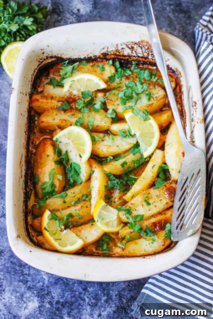 Greek Lemon Roasted Potatoes in casserole dish