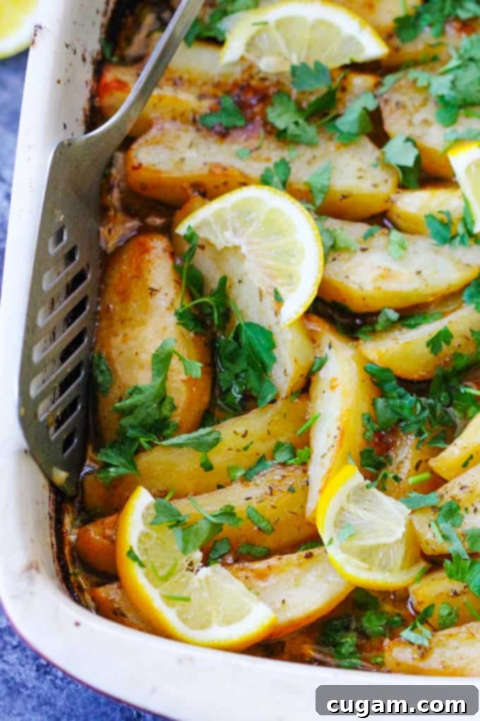 Close up shot of Greek Lemon Potatoes in a baking dish