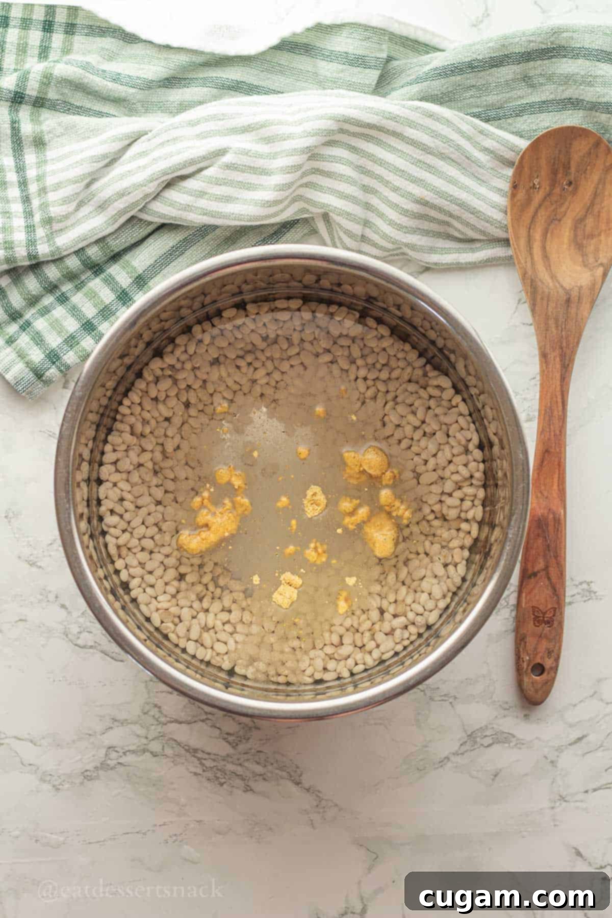Uncooked beans with water and chicken bouillon.