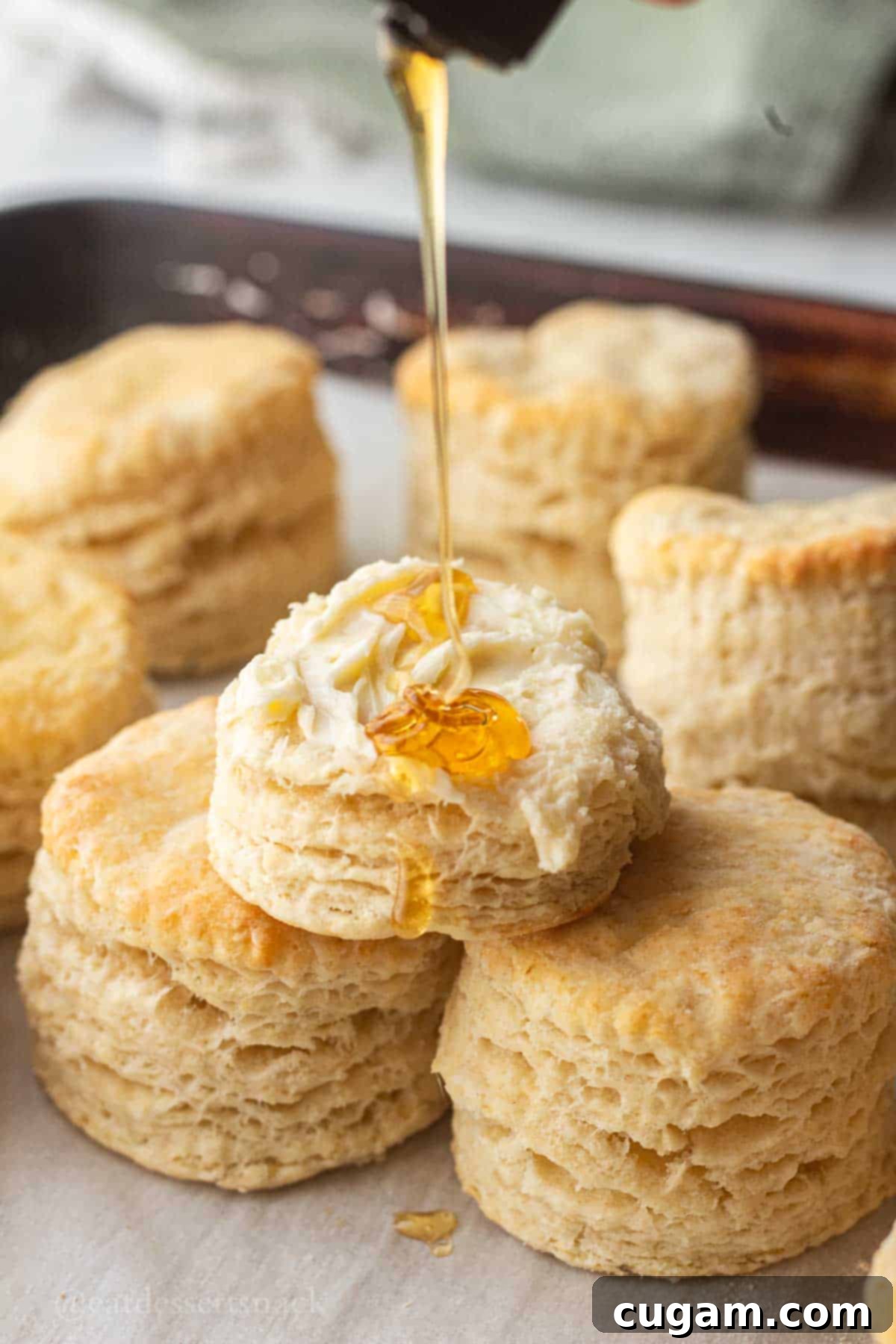 Flaky Sourdough Discard Biscuits 10 Drizzle honey on baked biscuit.
