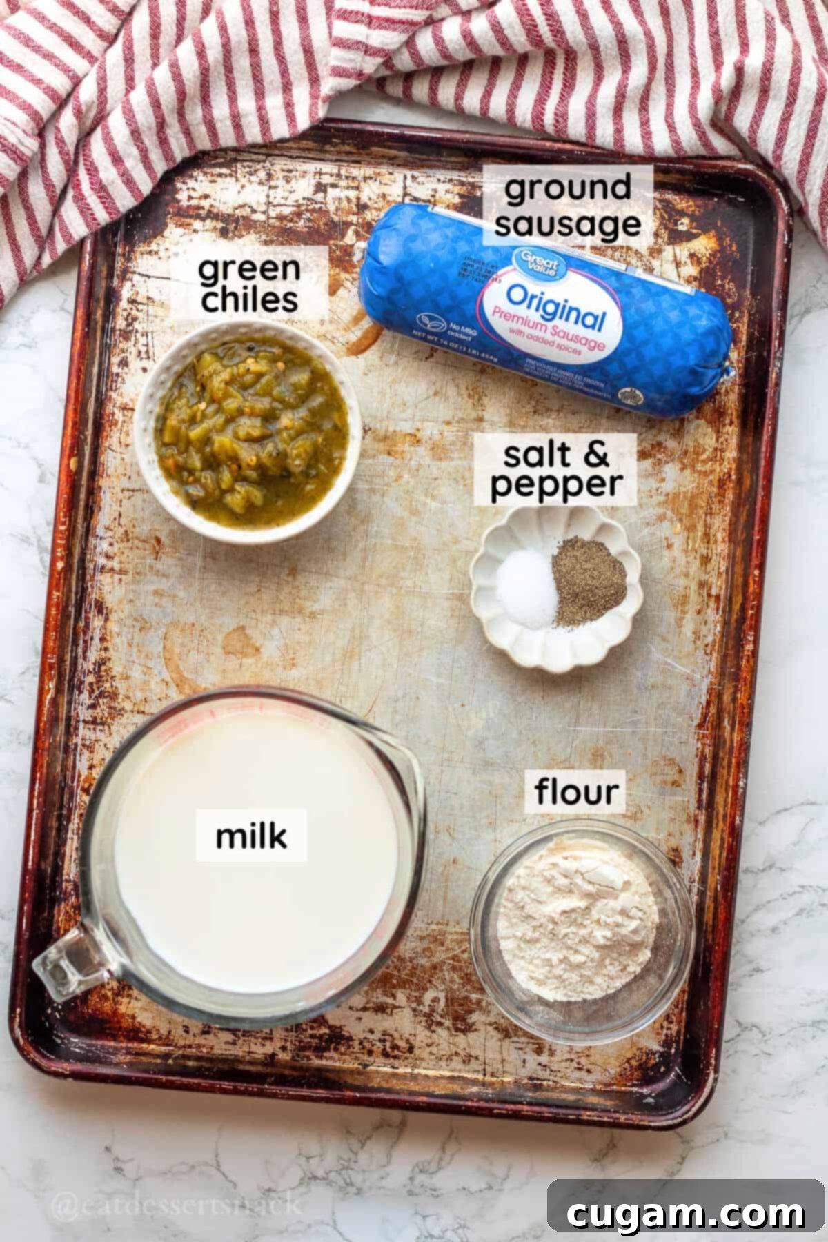 New Mexico Green Chile Sauce 3 Labeled ingredients for green chili gravy in glass bowls on metal pan.