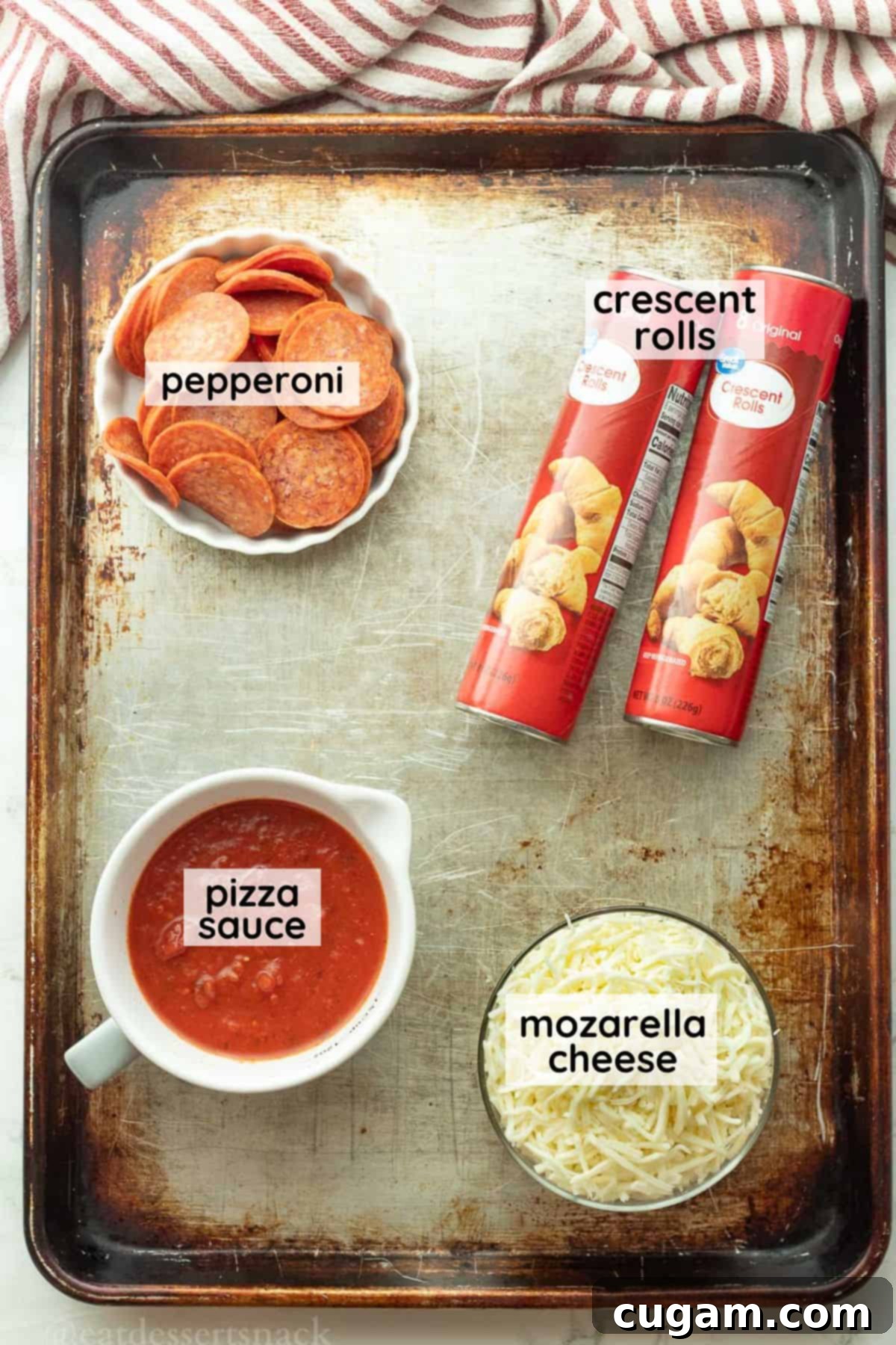 Halloween Witchy Crescent Treats 3 Ingredients for witch hat crescent rolls on metal pan labeled.