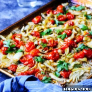 Rustic Italian Roasted Fennel and Tomatoes 6 Roasted fennel with tomatoes on a cookie sheet