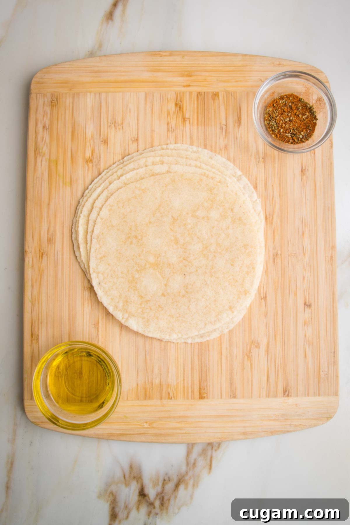 Ingredients for baked tortillas strips to go into taco soup. Tortillas, olive oil and taco seasonings.