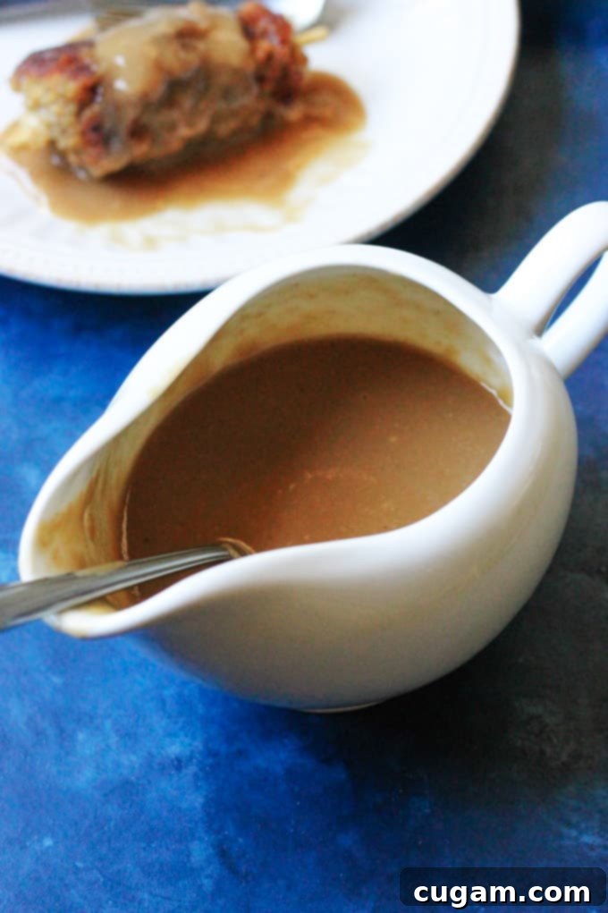 Delicious, golden homemade gravy in a rustic serving dish