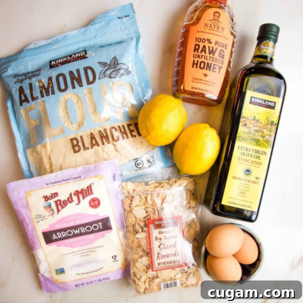 Ingredients for gluten-free lemon cake: almond flour, arrowroot powder, sliced almonds, lemons, honey, olive oil and eggs.
