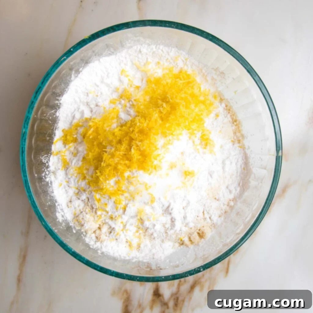 Zesty Gluten Free Lemon Cake 5 Dry ingredients for olive oil cake: almond flour, arrowroot powder and lemon zest.