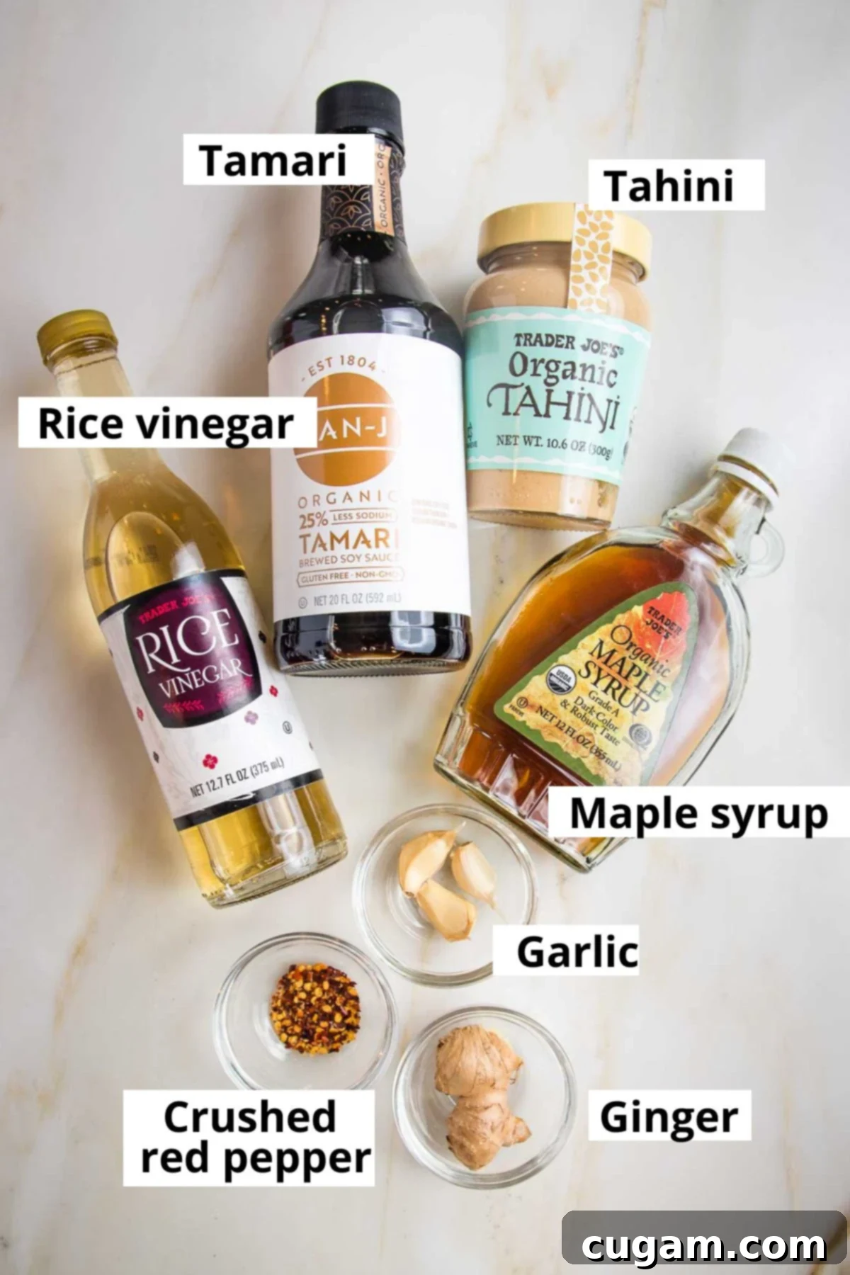 Labeled ingredients: rice vinegar, tahini, tamari, maple syrup, ginger, garlic, red pepper flakes.