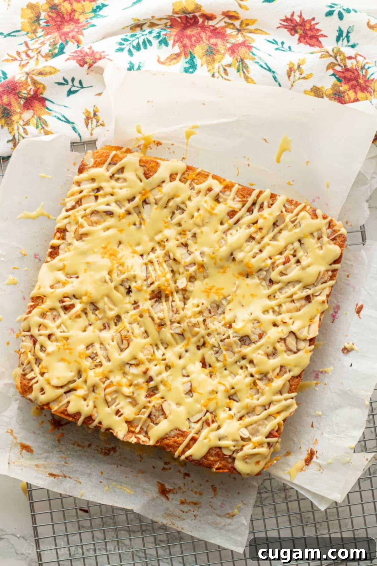 Close-up of a beautifully baked cranberry orange coffee cake, perfectly glazed and ready to be served.