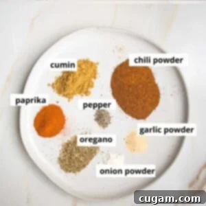 Taco seasoning ingredients labeled: chili powder, cumin, paprika, pepper, oregano, garlic powder, onion powder.