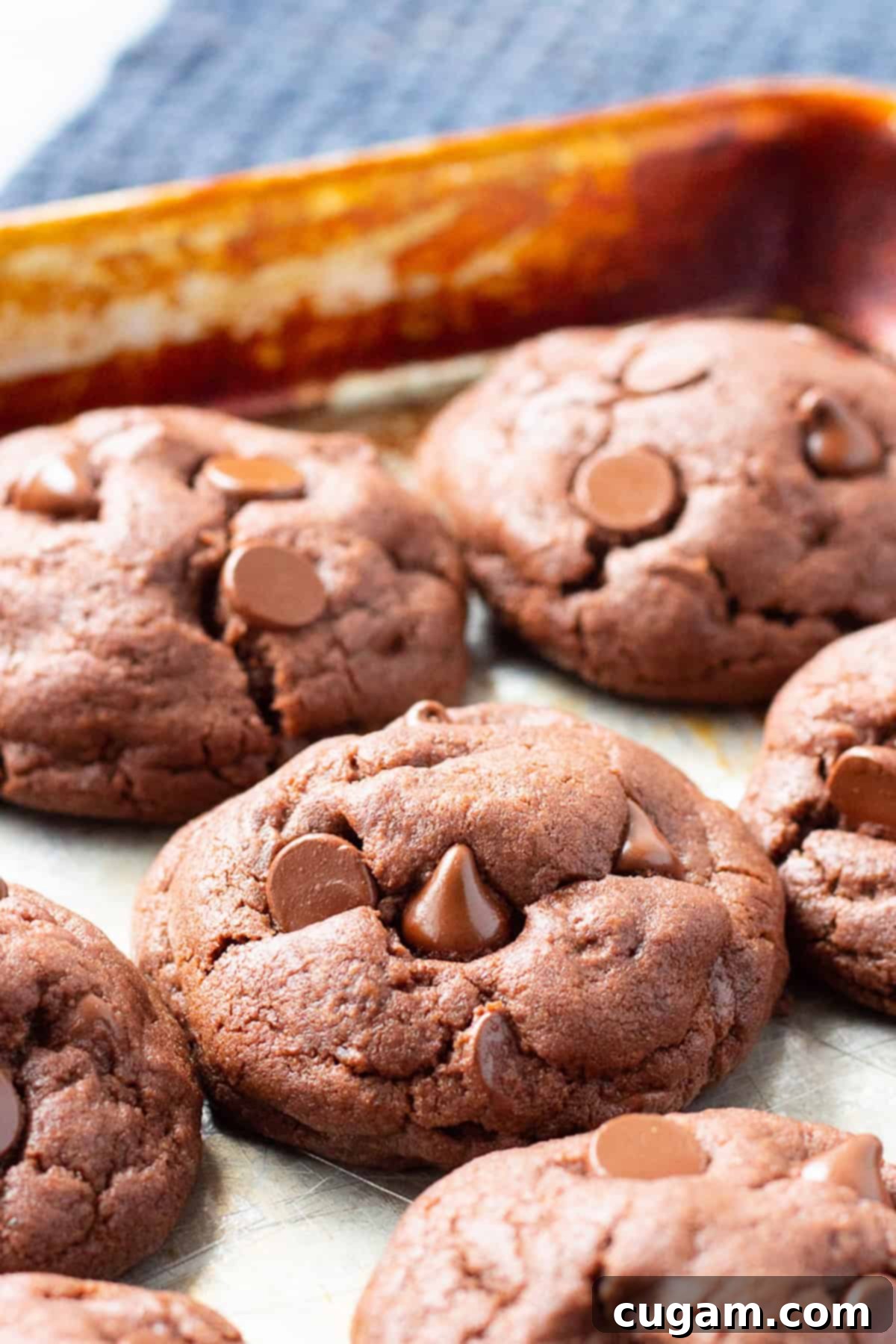 Baked Chocolate Pudding Mix Cookies on metal baking sheet.