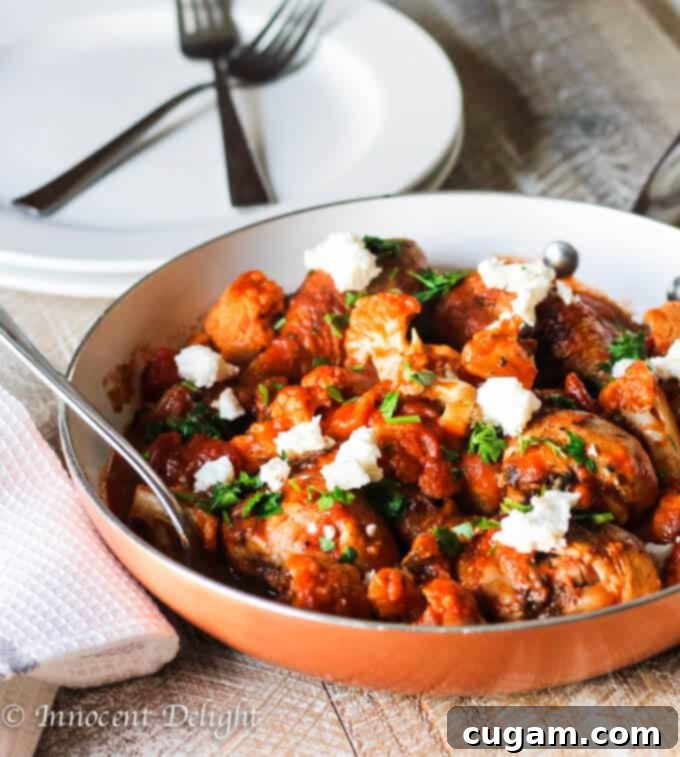 Close-up of Greek Chicken with Tomatoes, Cauliflower and Feta