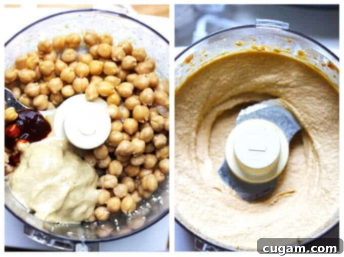 A serving bowl filled with creamy Chipotle Hummus, generously topped with golden roasted pine nuts, fresh parsley, and a swirl of olive oil.
