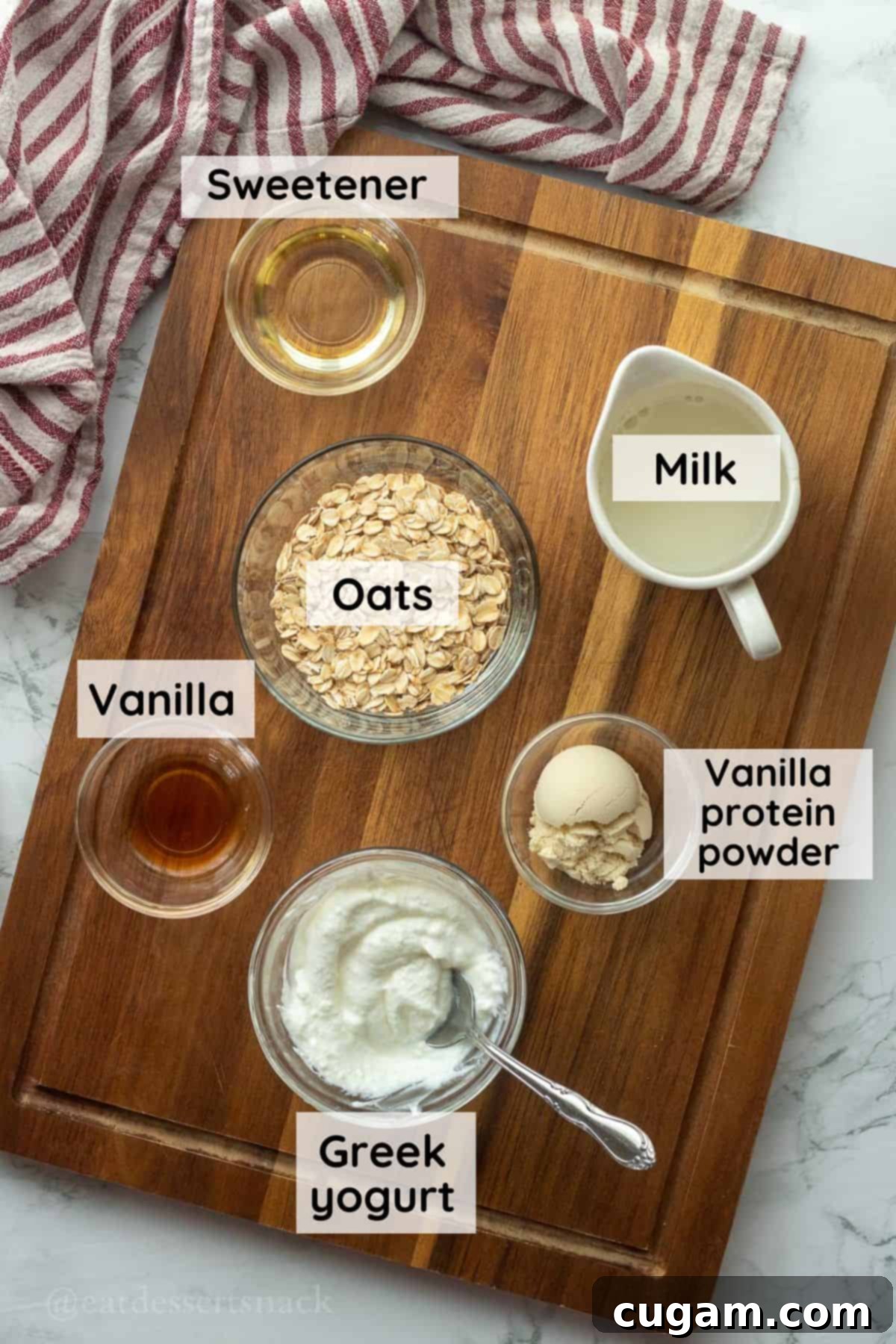 Labeled ingredients for vanlla overnight oats: milk, oats, vanila, protein powder, greek yogurt and sweetener.