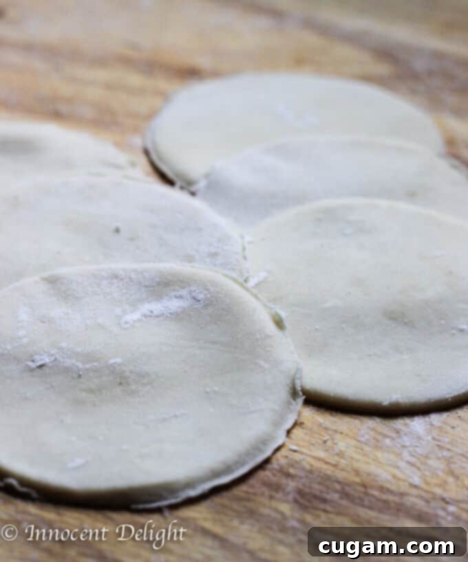 Homemade Sauerkraut and Mushroom Pierogi 5 Rolling Pierogi Dough and Cutting Circles