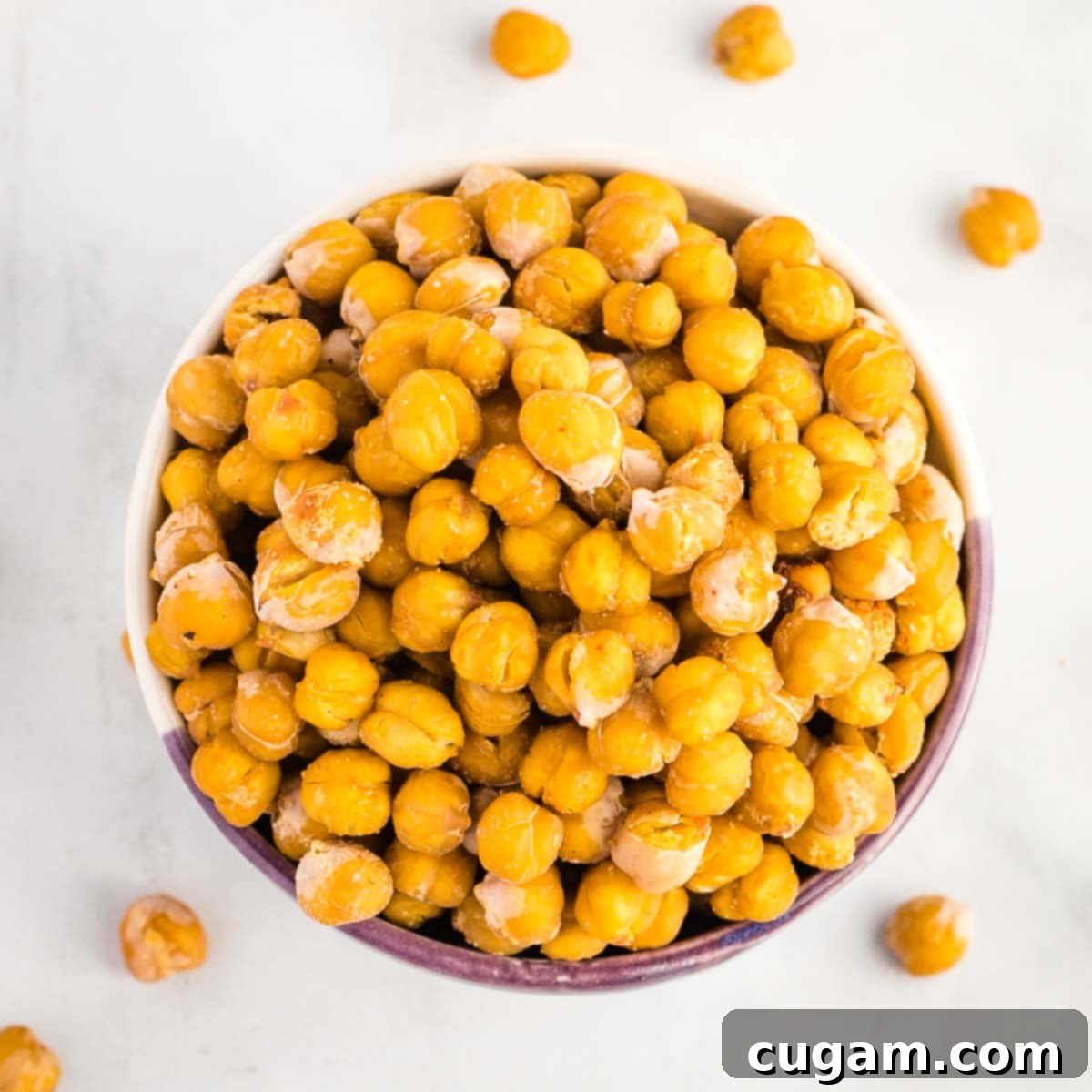 Crispy roasted chickpeas stored in an open bowl at room temperature.
