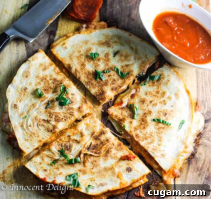 Crispy Margarita Pizza Quesadilla, perfect for a quick snack or meal.