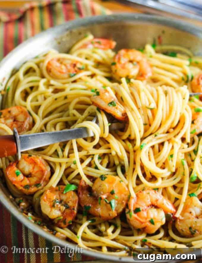 Garlic Shrimp Scampi Spaghetti with fresh parsley.