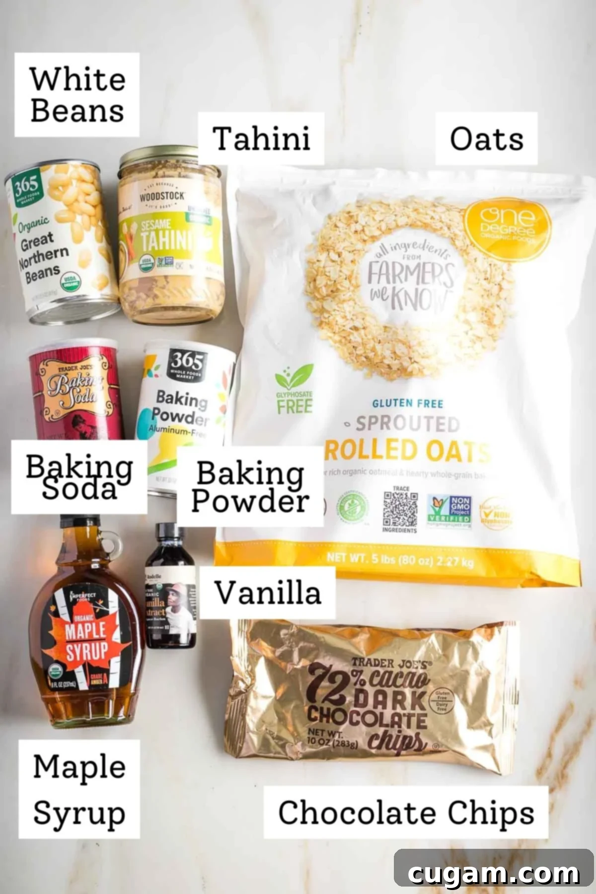 Labeled ingredients: oats, white beans, tahini, baking powder and soda, maple syrup, vanilla and chocolate chips.