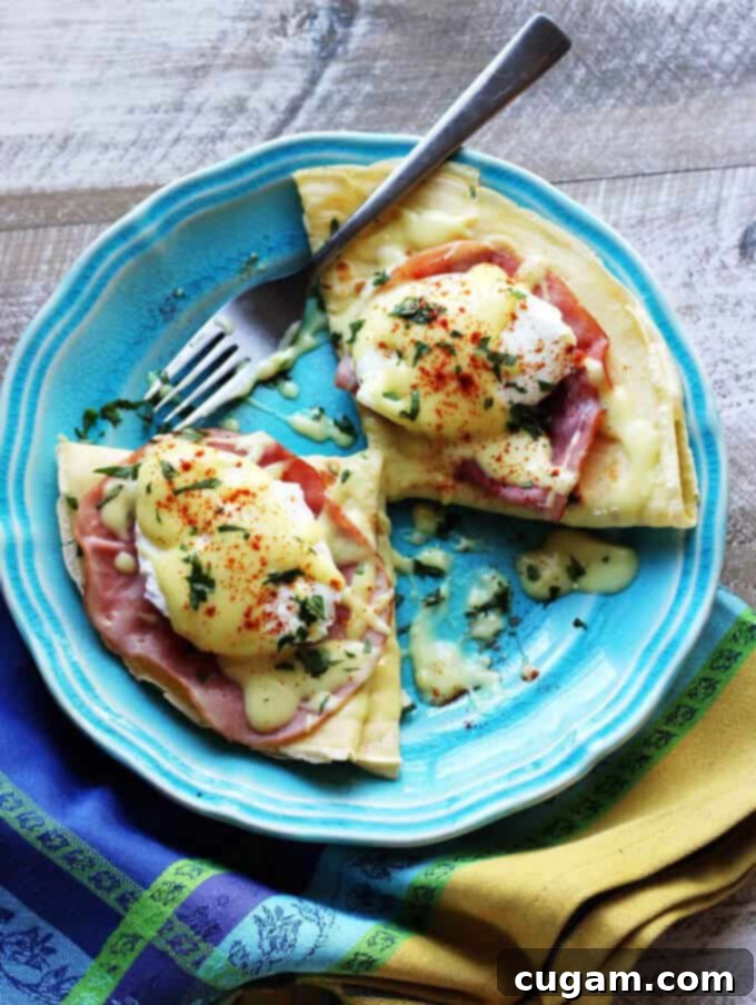 Easy Crepes Eggs Benedict Recipe - super easy twist on this classic American breakfast, paired with classic French crepes.