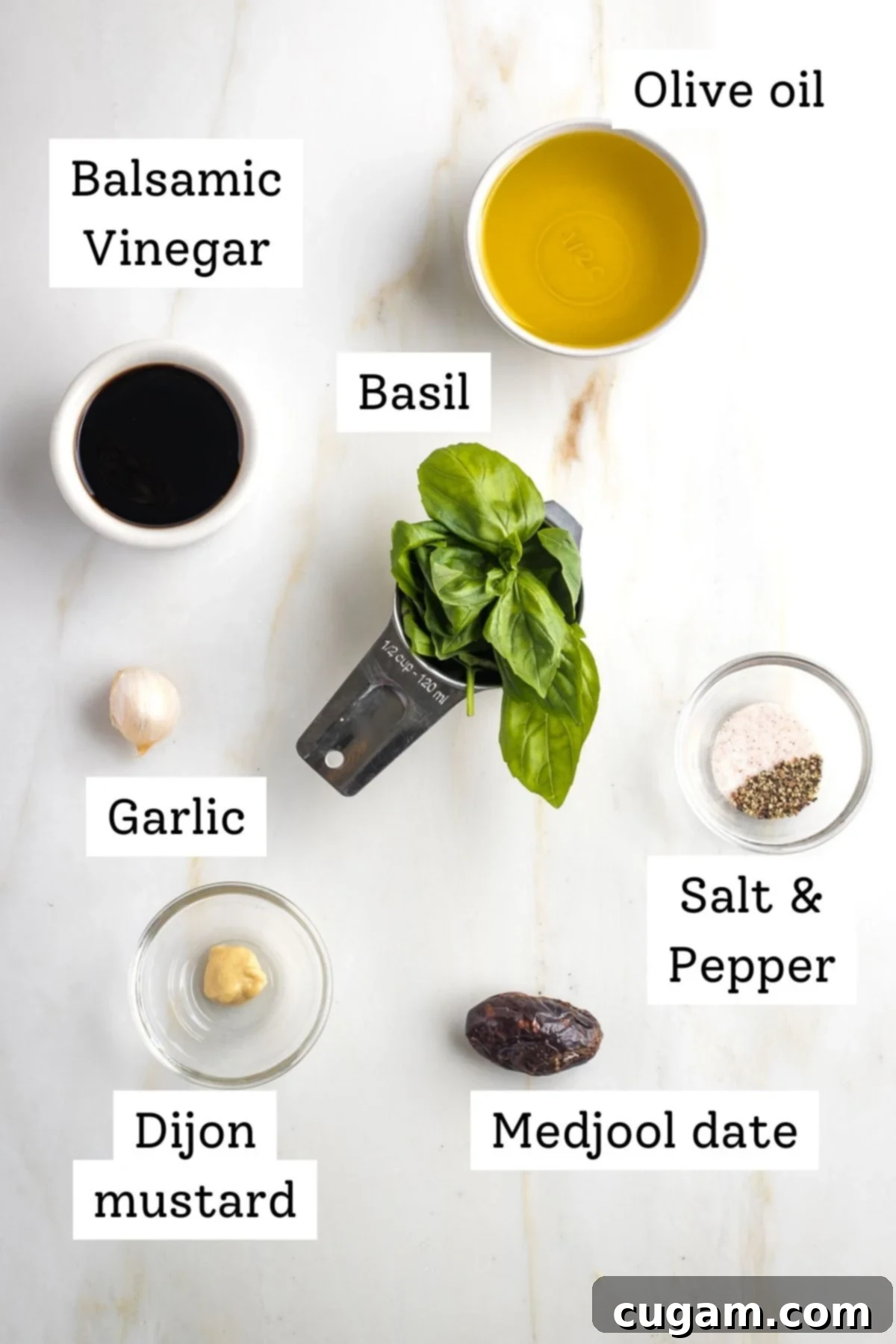 Labeled ingredients for basil balsamic vinaigrette: olive oil, balsamic, basil, garlic, mustard, date.