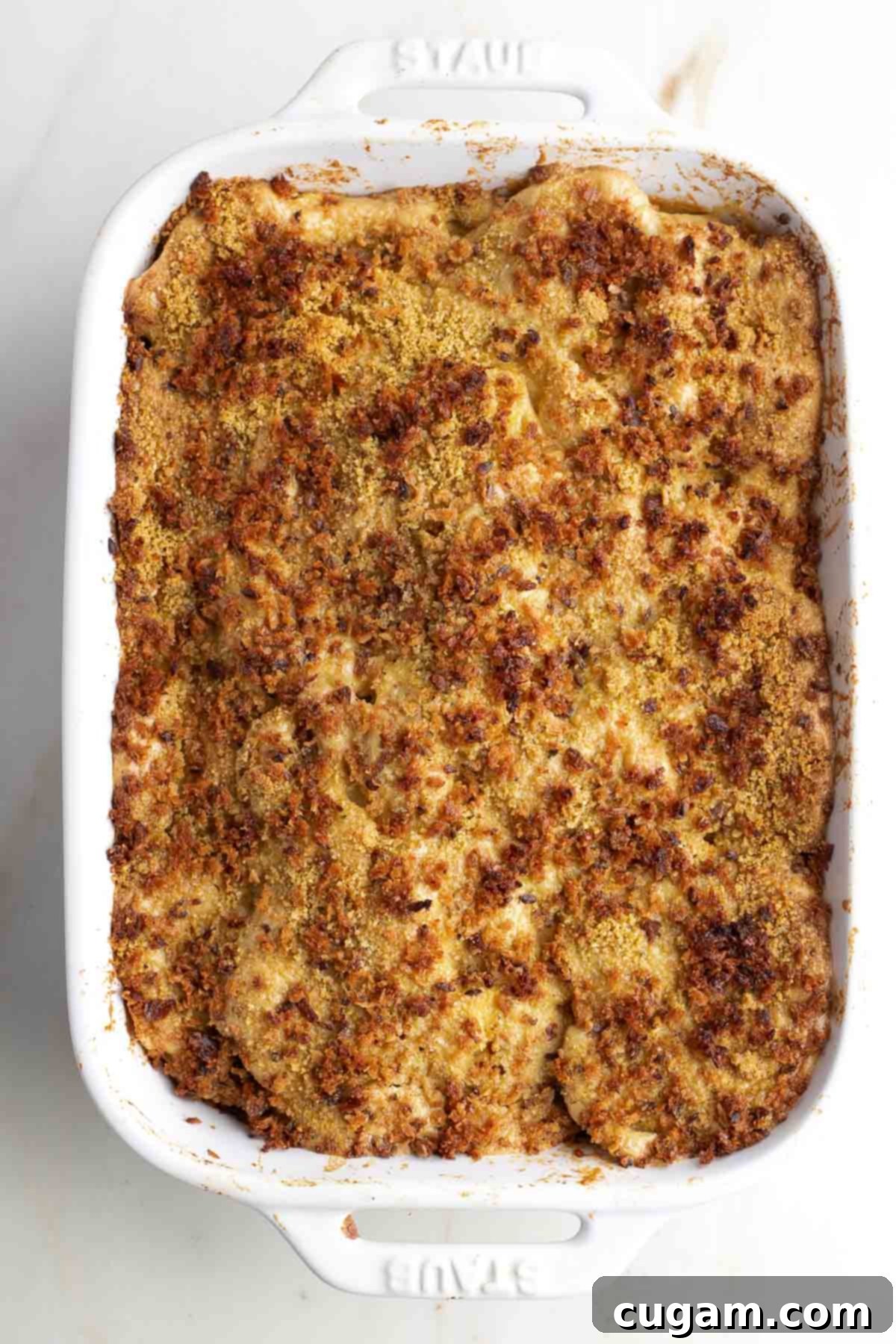 Baked parsnip gratin in a casserole dish.
