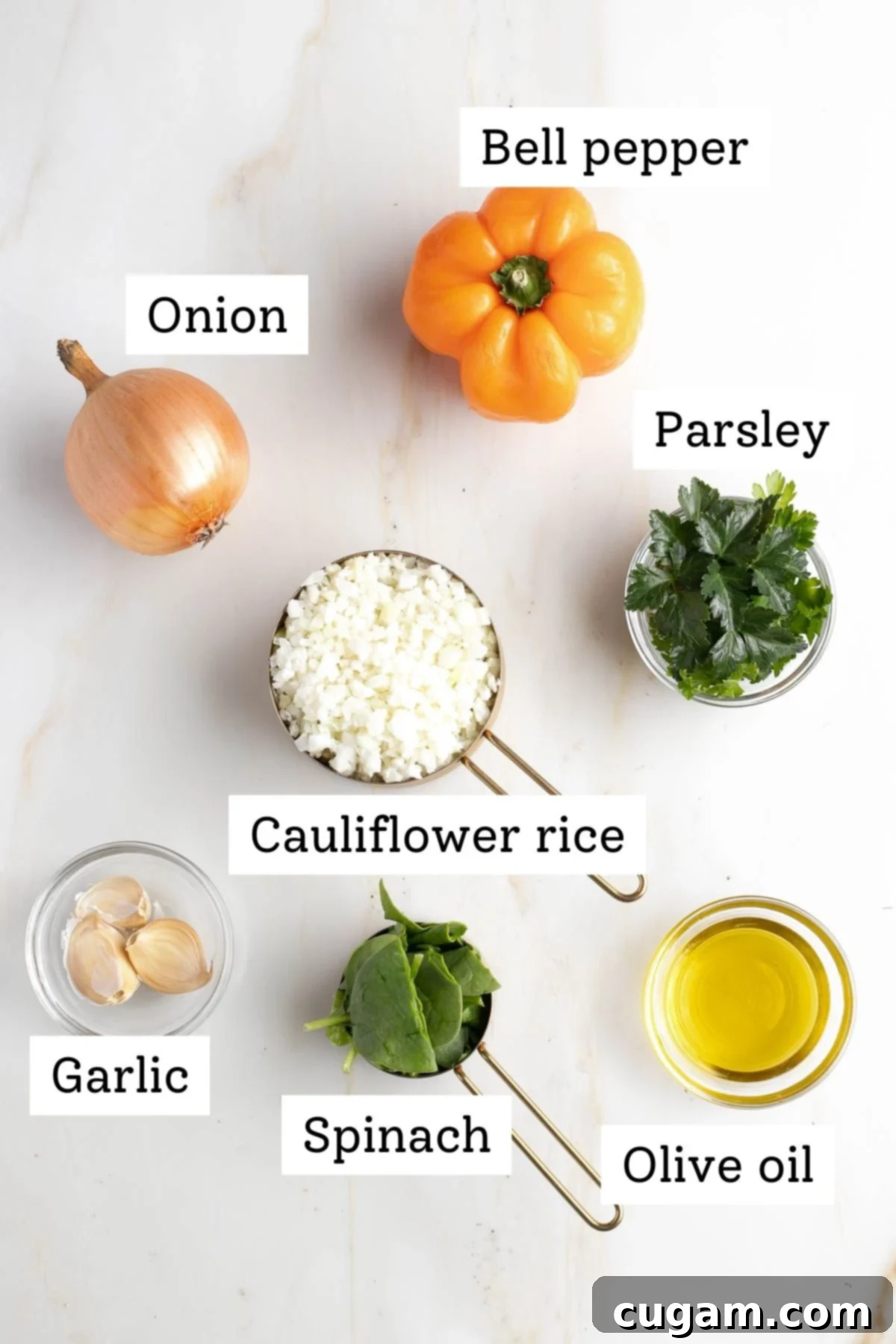 Labeled ingredients: bell pepper, onion, cauliflower rice, parsley, garlic, spinach and olive oil.