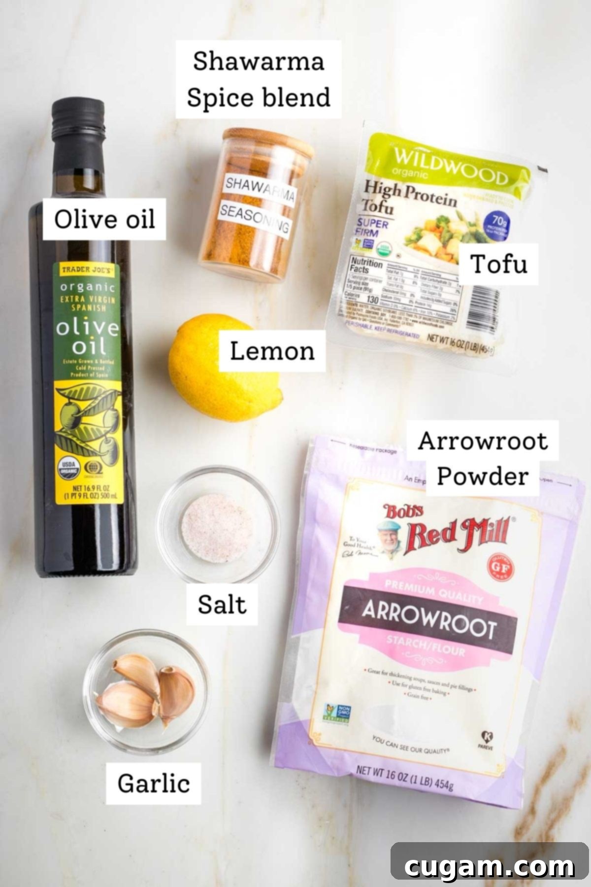 Labeled ingredients for tofu shawarma: olive oil, shawarma spice blend, tofu, arrowroot powder, garlic, salt and lemon.