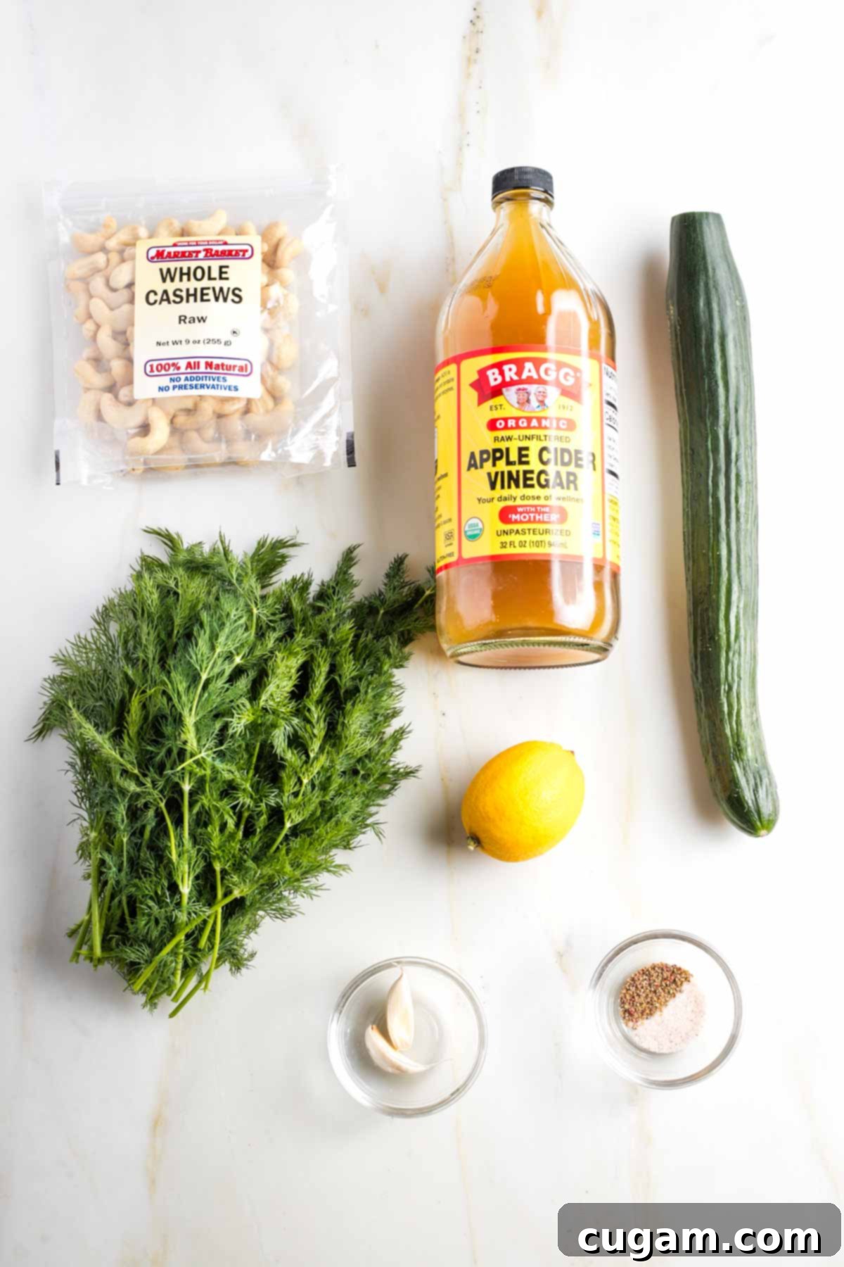 Ingredients for Tzatziki: cashews, apple cider vinegar, cucumber, fresh dill, lemon, garlic cloves, salt and pepper. 