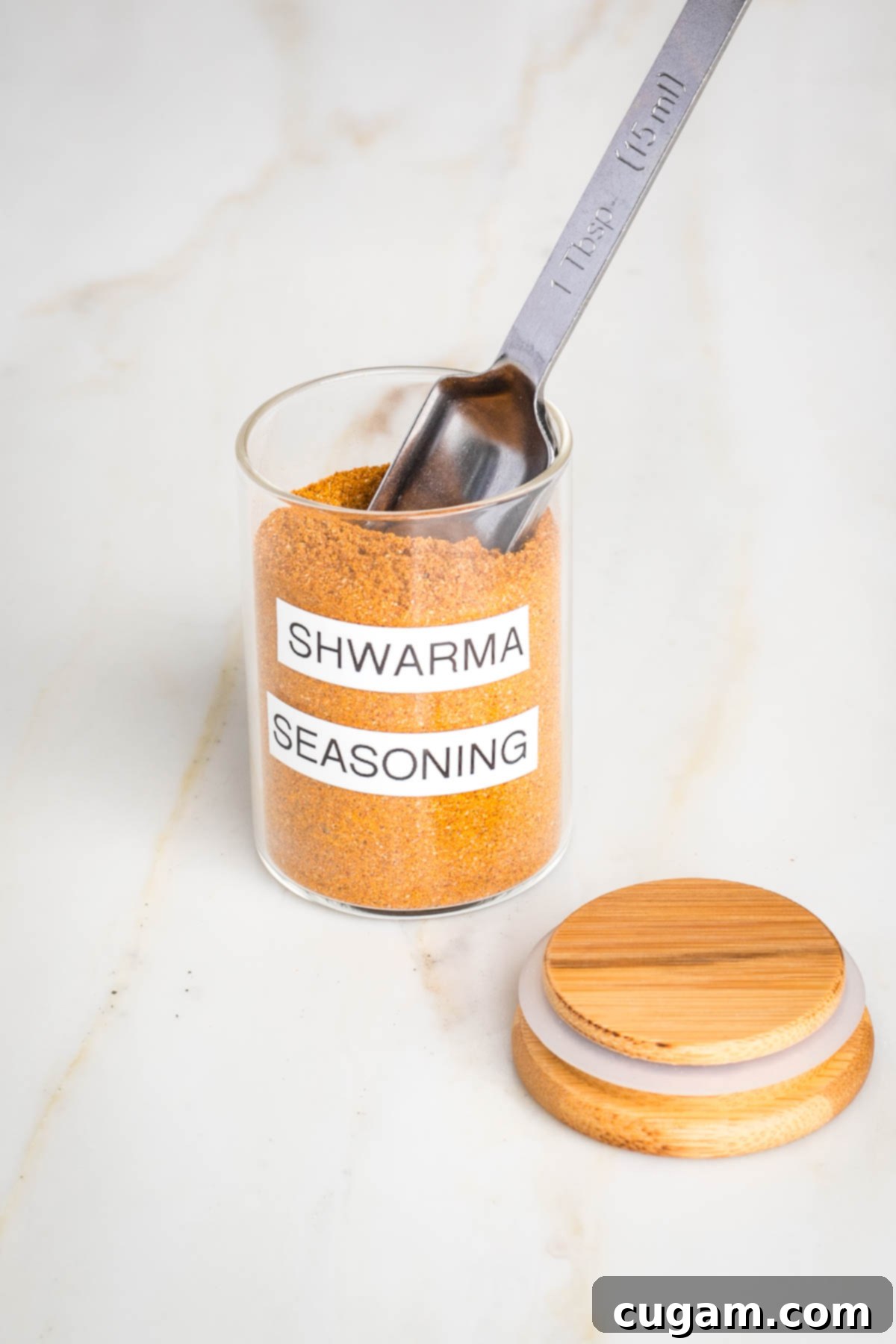 Craft Your Own Shawarma Seasoning 6 Cooked shawarma chicken with fresh vegetables in a bowl.