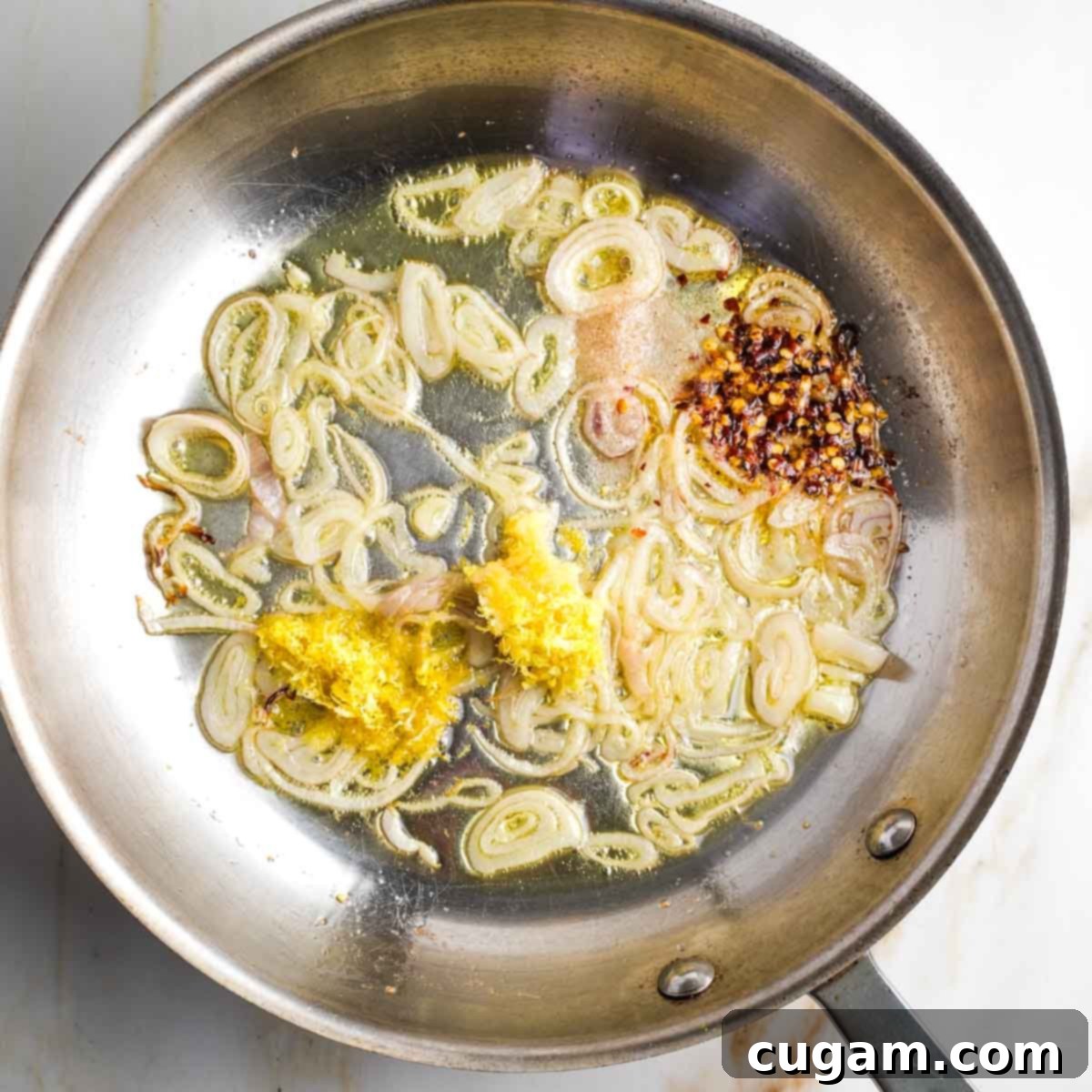 Sauteed onions with lemon zest and garlic, and a spoonful of mustard.