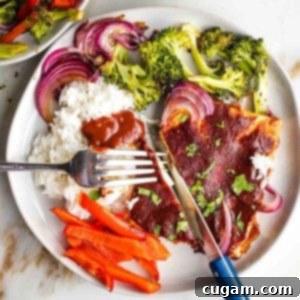 Rice, bbq tofu, red peppers, broccoli and red onions.