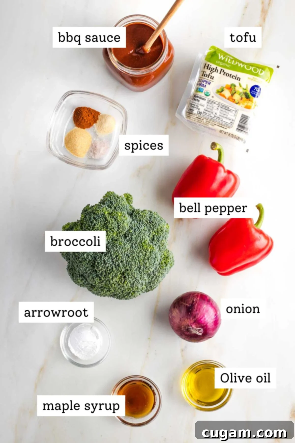 Labeled ingredients: bbq sauce, spices, tofu, broccoli, red peppers, red onion, maple syrup, arrowroot powder, olive oil.