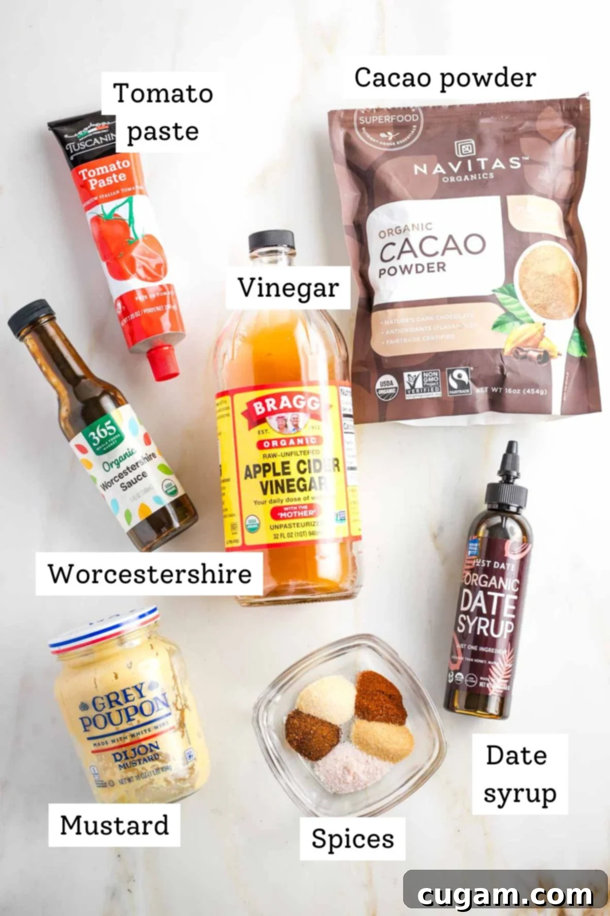 Labeled ingredients: tomato paste, cacao powder, apple cider vinegar, date syrup, dijon mustard, worcestershire sauce and spices. 