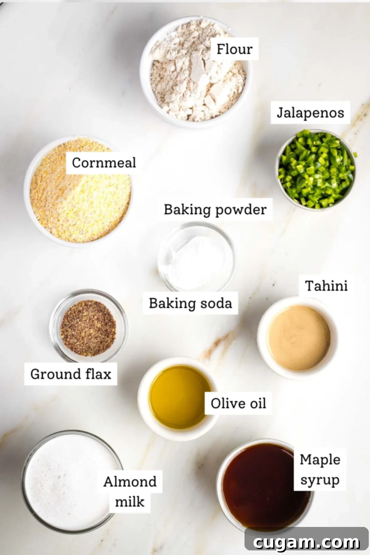 Labeled ingredients: flour, cornmeal, jalapenos, almond milk, maple syrup, tahini, baking powder and soda, ground flax and olive oil.