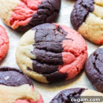 Neapolitan Layered Cookies 11 Baked Neapolitan cookie on metal baking sheet, showcasing its three distinct colors and inviting texture.