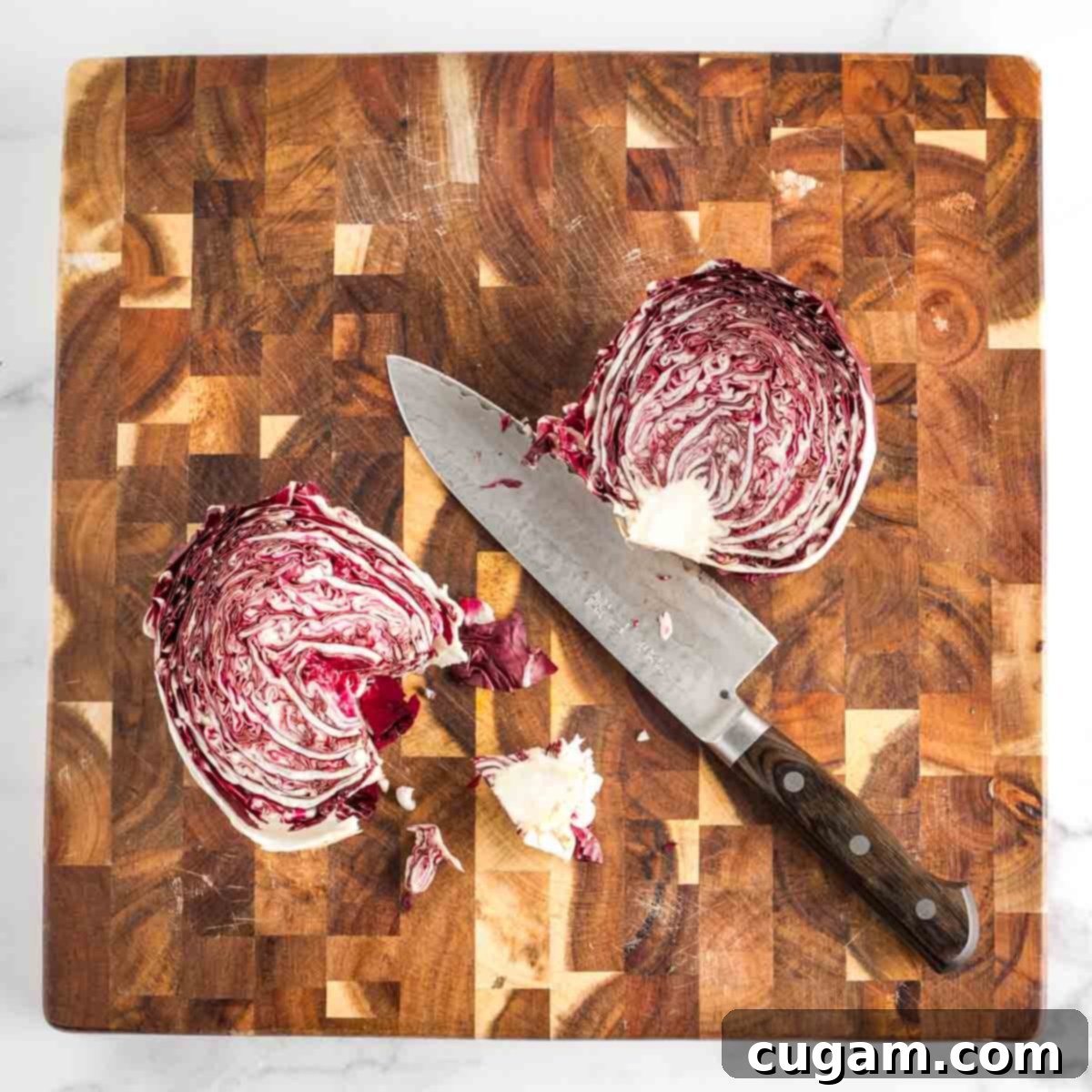 Vibrant Radicchio Chickpea Salad with Tahini 5 Head of radicchio cut in half through the core, one side the core is removed.
