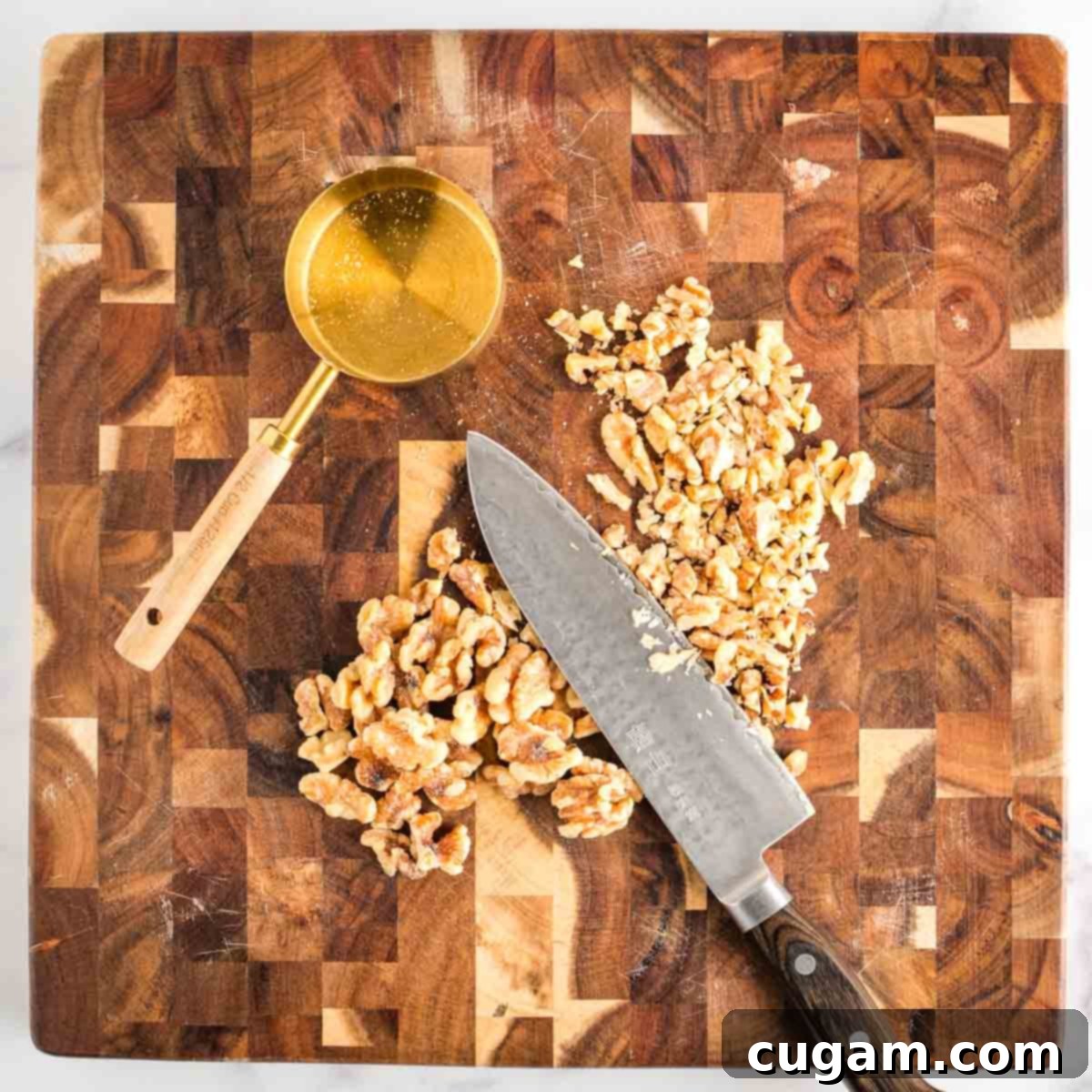 Vibrant Radicchio Chickpea Salad with Tahini 10 ½ cup measure plus a heap of walnuts, some already roughly chopped.