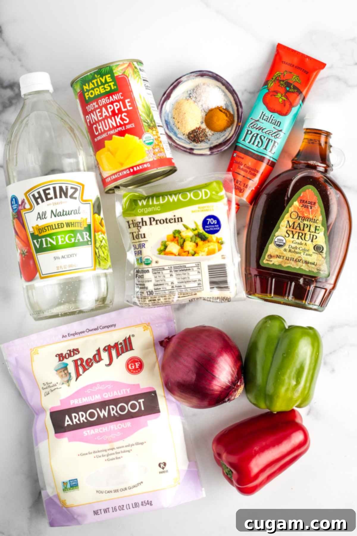 Sticky Sweet and Sour Crispy Tofu 3 Ingredients for sweet and sour tofu: arrowroot powder, onion, bell pepper, tomato paste, maple syrup, vinegar, spices, canned pineapple, extra firm tofu.
