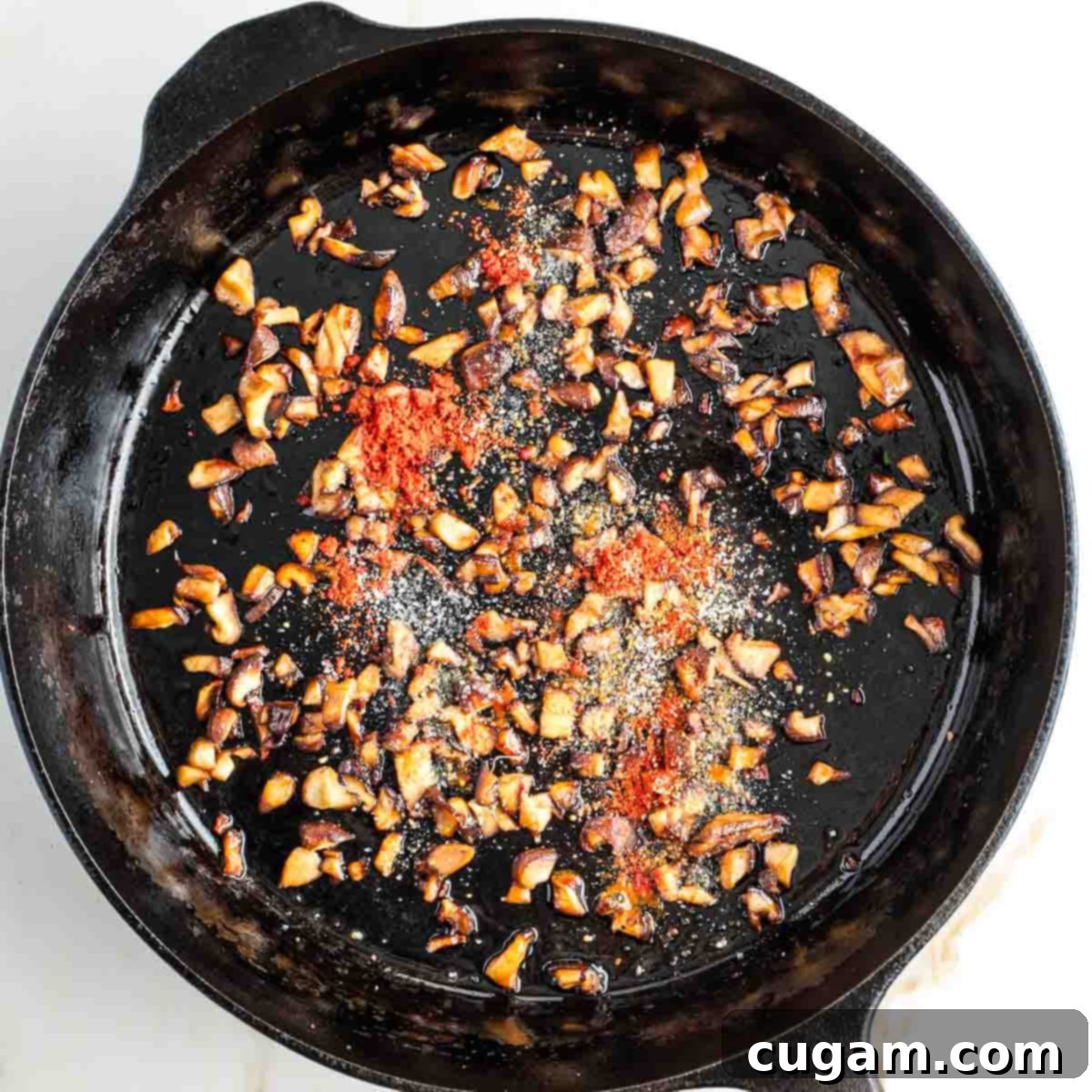 Sauteed diced shiitake mushrooms sprinkled with paprika, salt and pepper.