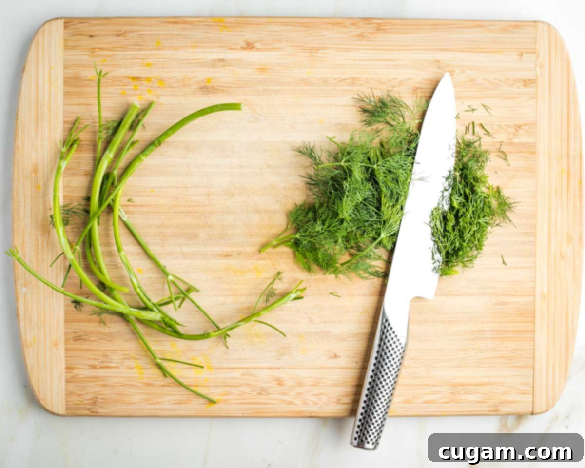 Fresh dill fronds separated from the stems and then minced.