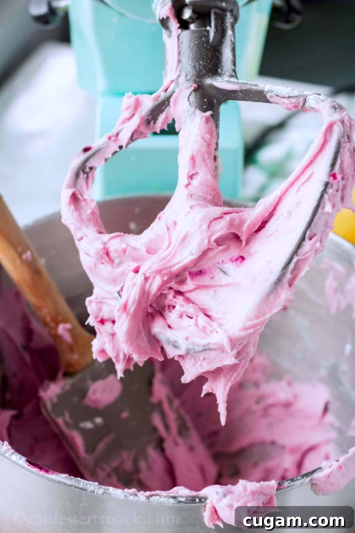 Blackberry Frosting on paddle attachment of mixer. 