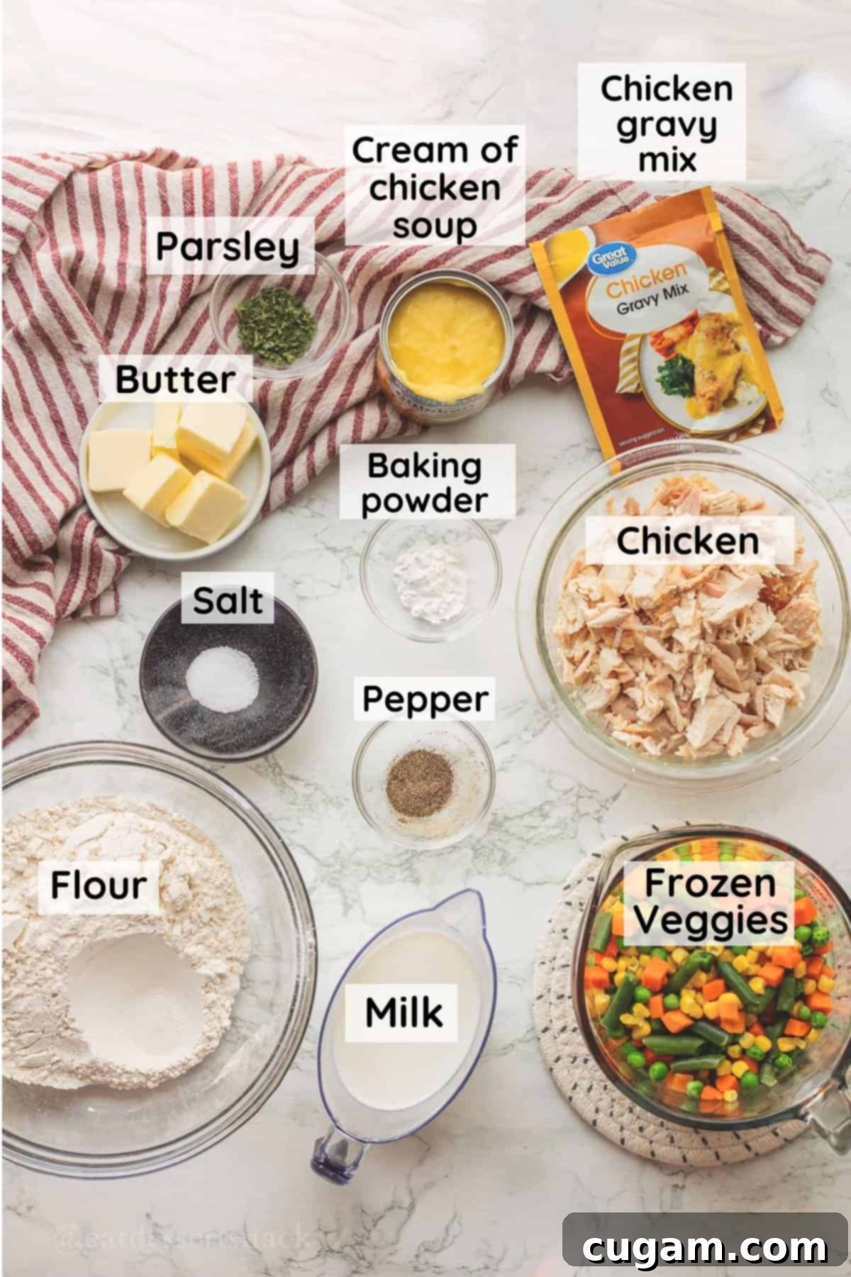 Quick Chicken Pot Pie 3 Ingredients for chicken pot pie in glass bowls on marble countertop.