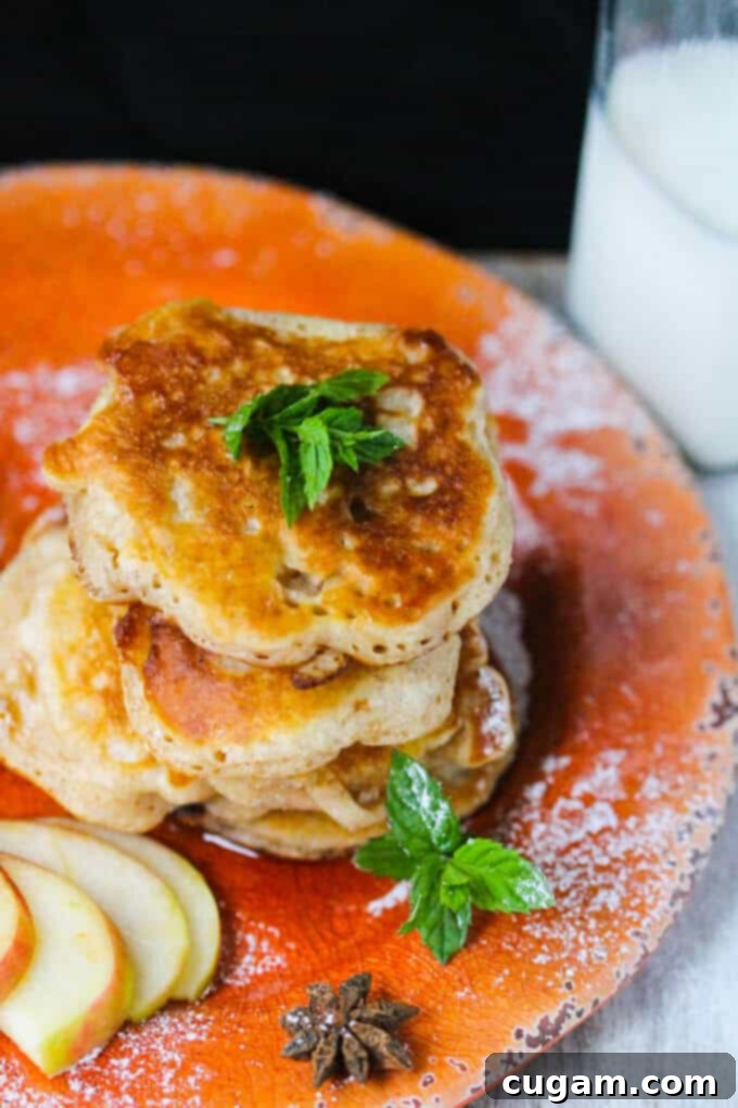 Polish Fluffy Apple Pancakes - Racuchy - served with powdered sugar
